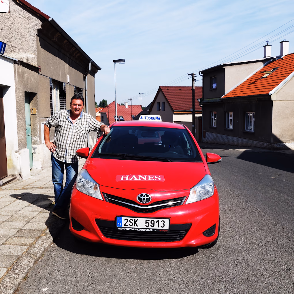 Jiří Hanes with an Autoškola Hanes training car in Kladno